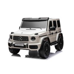 Elektrické autíčko Mercedes-Benz G63 AMG 4x4² Dvoumístné 12V, bílé, MP3 Přehrávač s USB/AUX vstupem, Pohon 4x4, Baterie 12V14Ah, EVA kola s odpružením, Koženková sedadla, Dálkový ovladač, Licencované